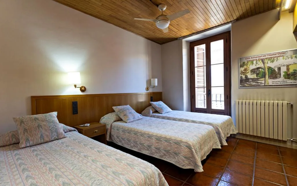 Chambre triple — Hostal Victor
