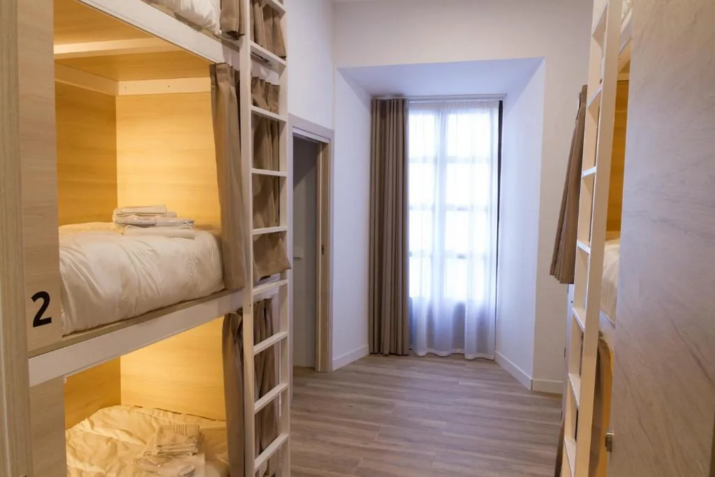 Cama em dormitório partilhado feminino com 6 camas — Hostel Casa Vargas Figueroa