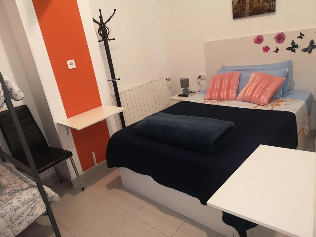 Quarto Quádruplo com casa de banho privativa — Hostel de las Facultades