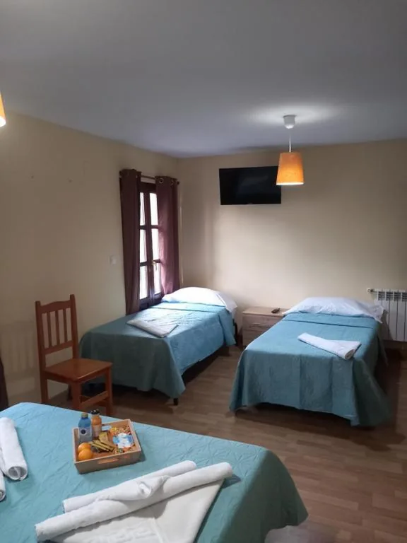 Habitación Triple — Hostería Río Negro