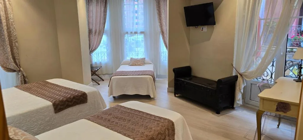 Habitación cuádruple — Hosteria Villa de Castro
