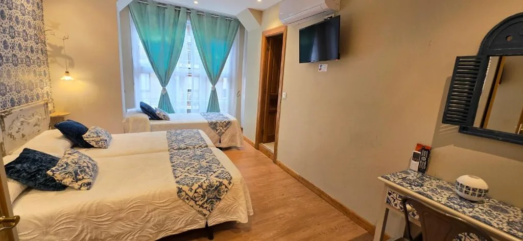 Habitación Triple — Hosteria Villa de Castro