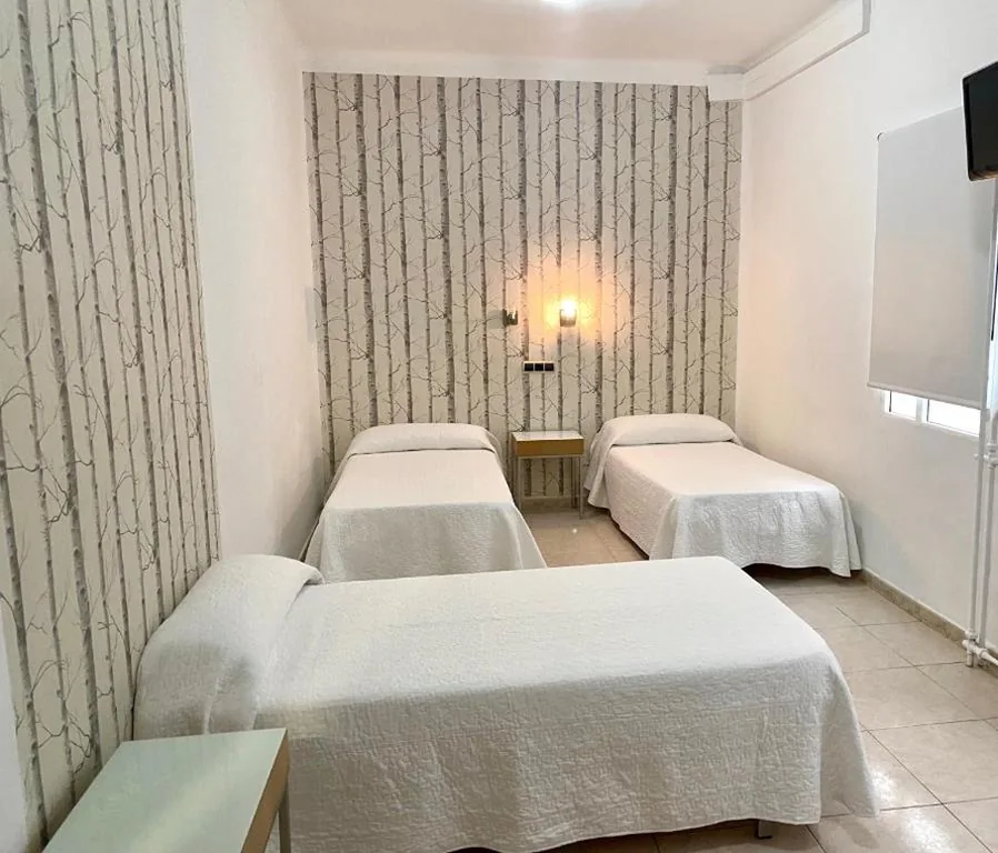 Doppelzimmer mit Zustellbett – 1 oder 2 Betten — Hotel Alamo