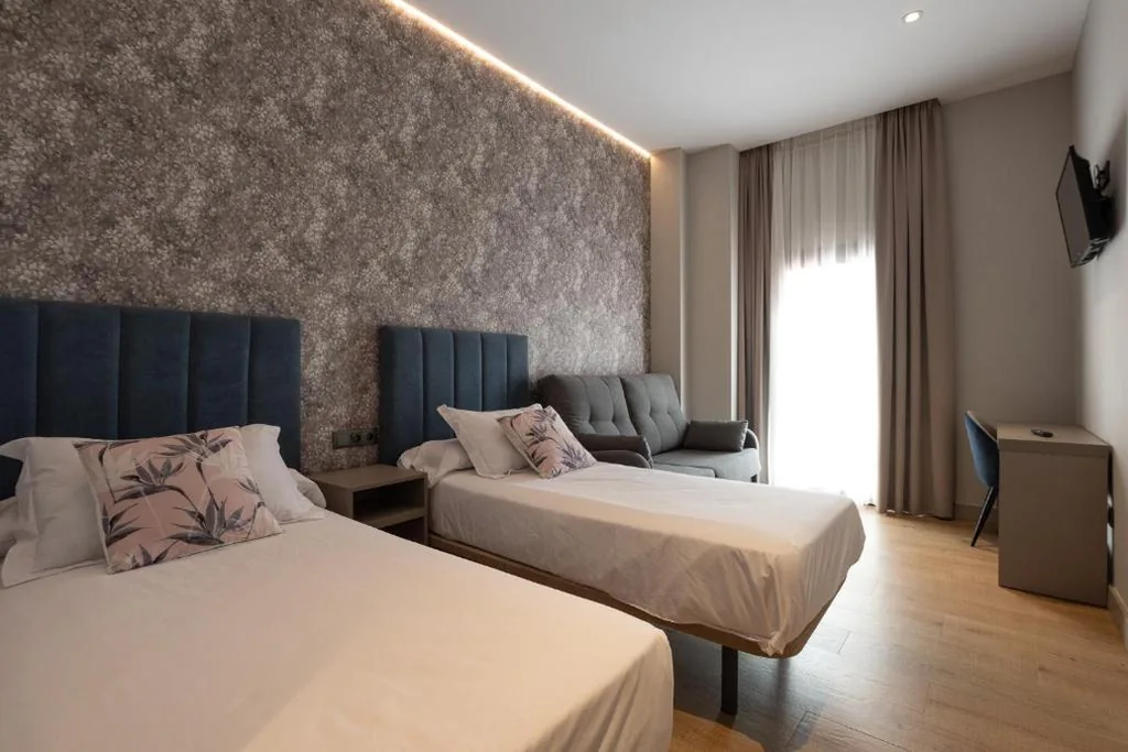 Habitación cuádruple — Hotel Aldama