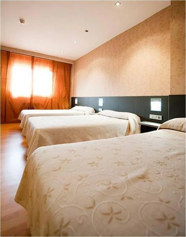Camera tripla — Hotel Area Serrano