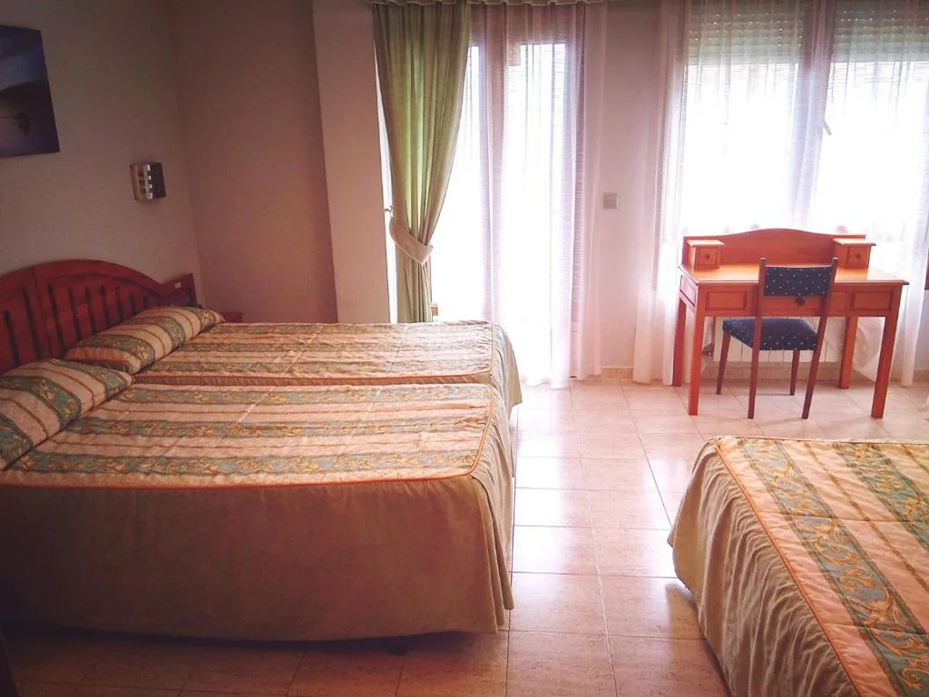 Quarto Triplo — Hotel Arillo