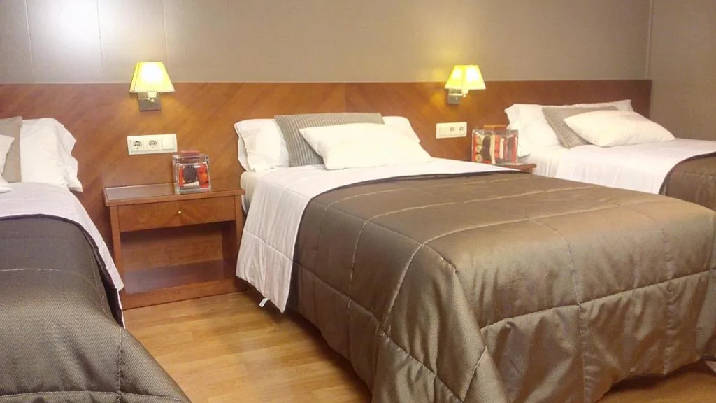 Driepersoonskamer — Hotel Avenida