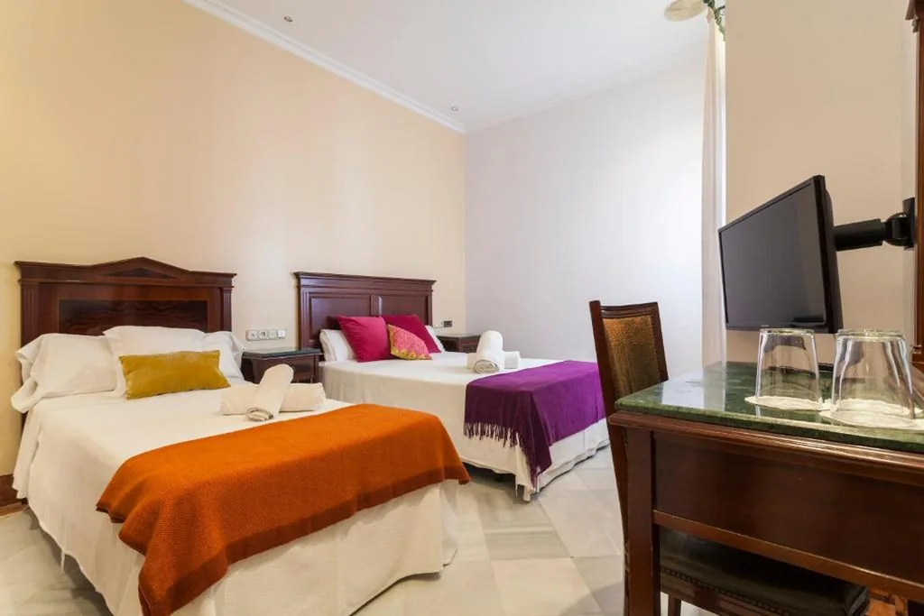 Habitación Triple — Hotel Baco