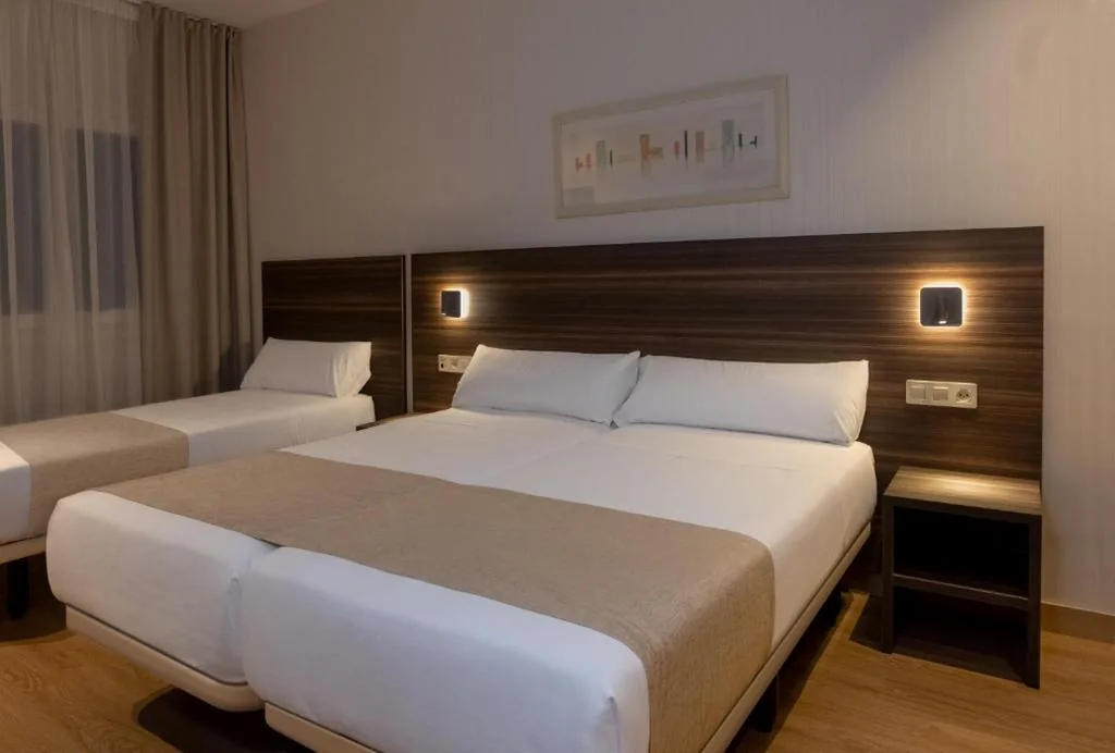 Quarto Triplo — Hotel Belcaire