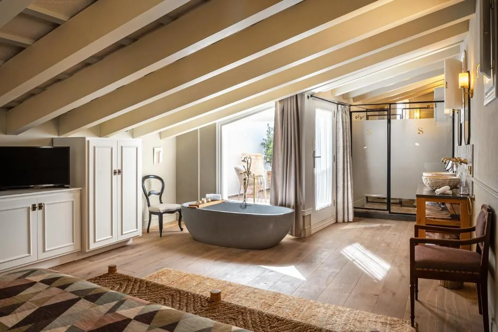 Suite con terraza — Hotel Boutique Can Sastre