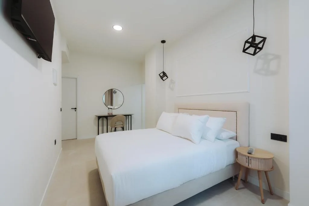 Chambre Deluxe avec très grand lit double — Hotel Boutique Crisal