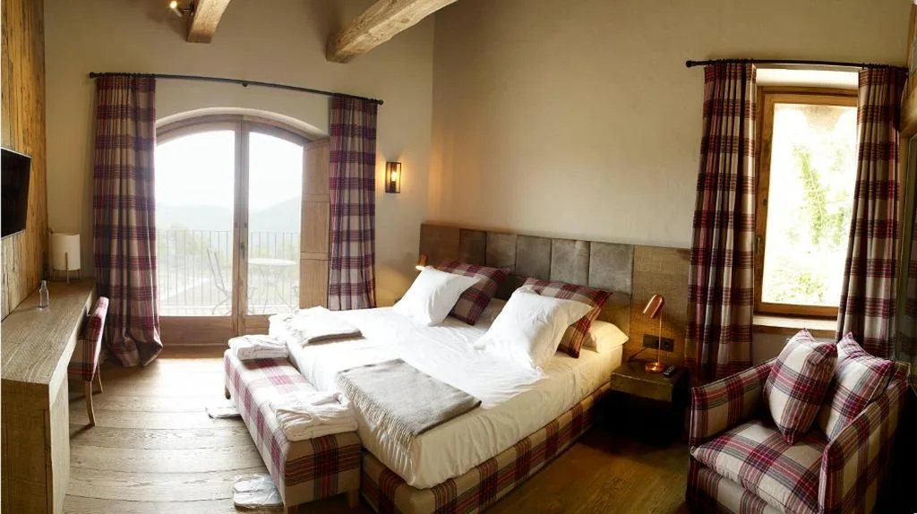 Suite Deluxe — Hotel Boutique Puig Francó