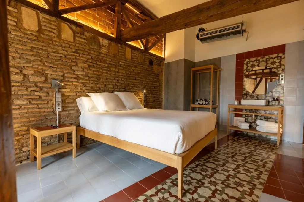 市街の景色を望むエセンシア・ダブルルーム — Hotel Boutique Quinta Esencia