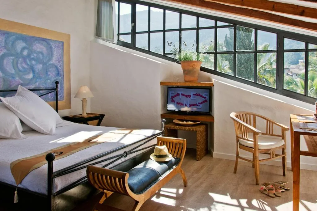 Familiensuite (2 Erwachsene + 2 Kinder) — Hotel Can Roses