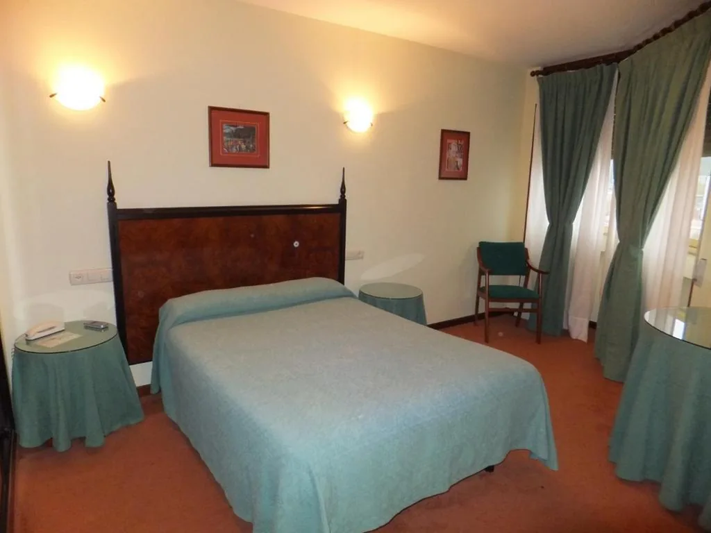 Habitación Individual — Hotel Canal