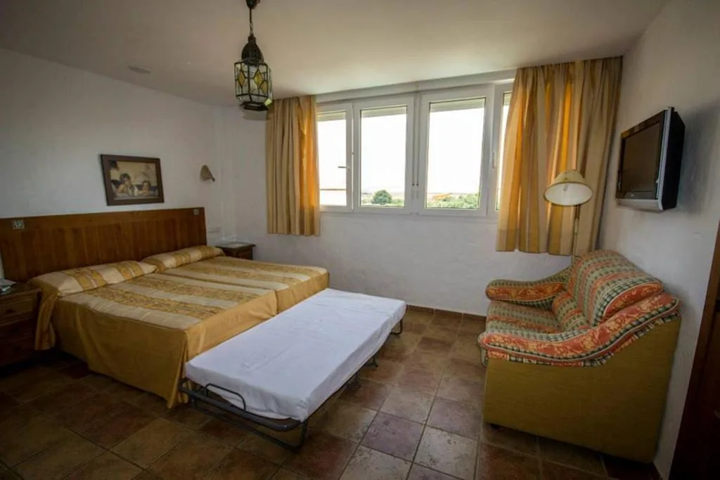 Habitación Triple — Hotel Casa Grande