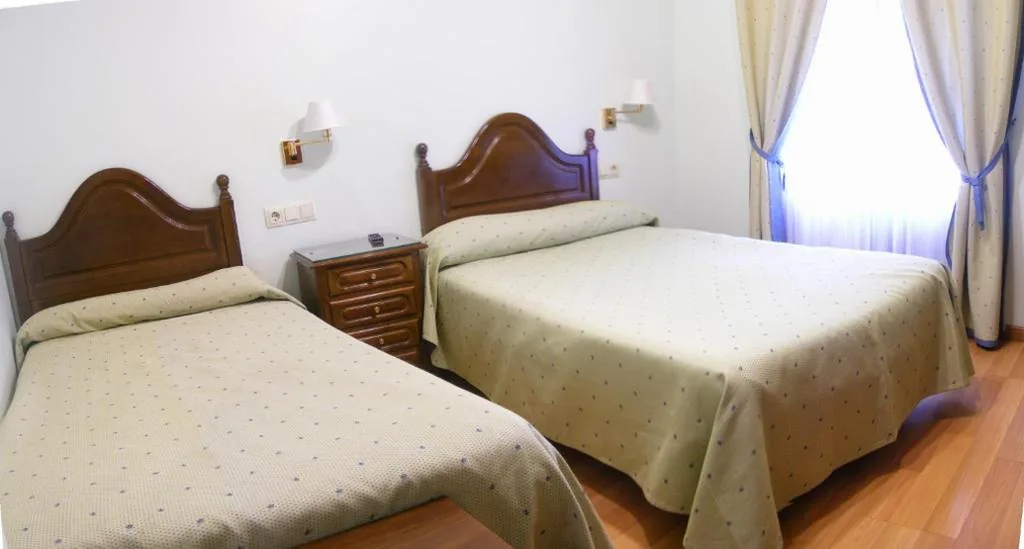 Camera doppia con letto supplementare — Hotel Chipén
