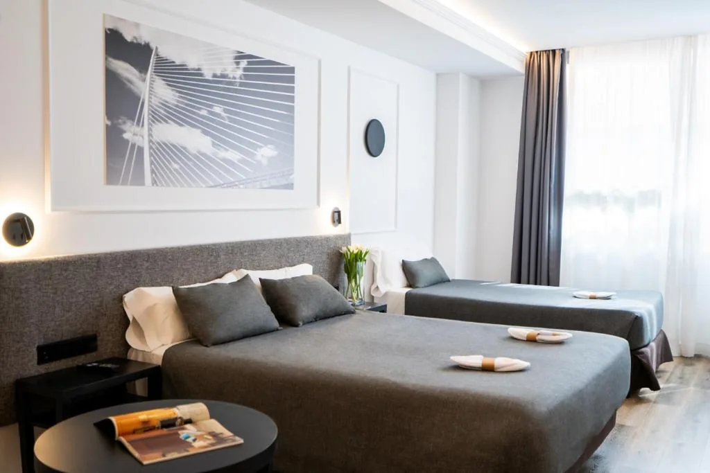 Habitación Triple — Hotel Conqueridor