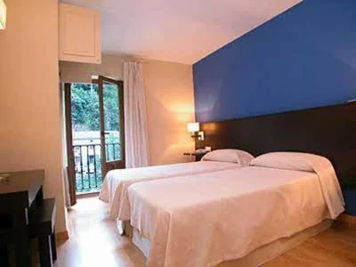 Economy-Doppelzimmer mit 2 Einzelbetten — Hotel Cosgaya