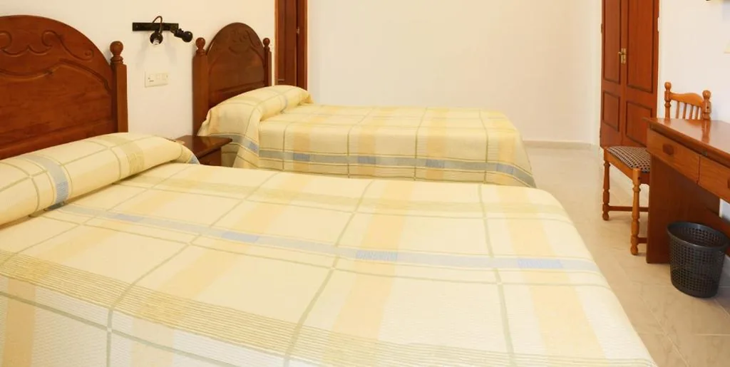 Chambre triple — Hotel El Coloso