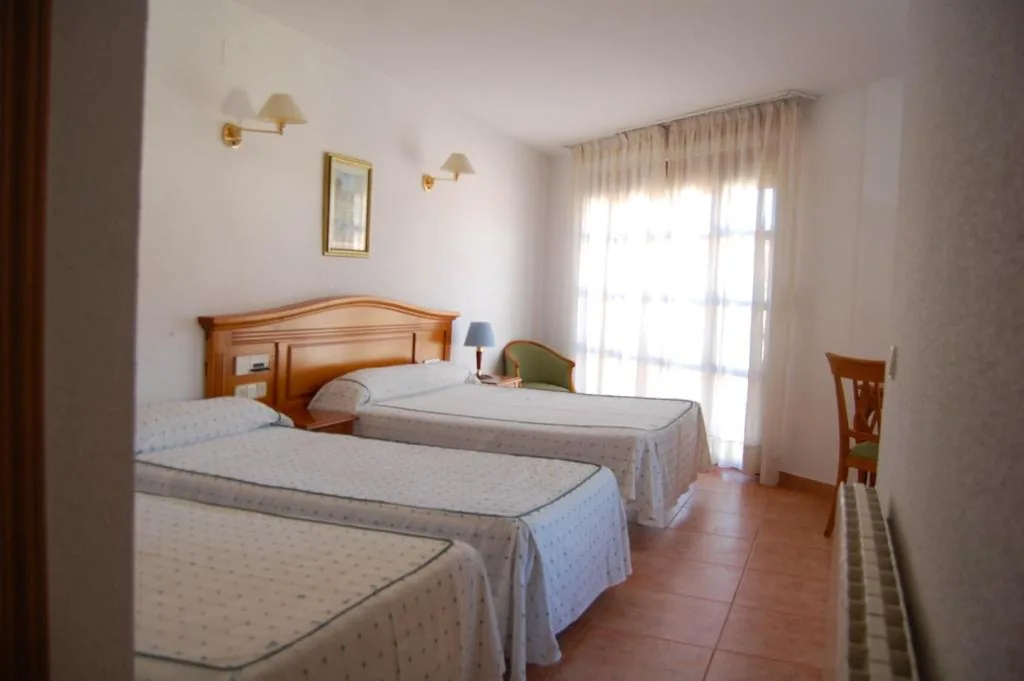 Habitación cuádruple — Hotel El Gamo