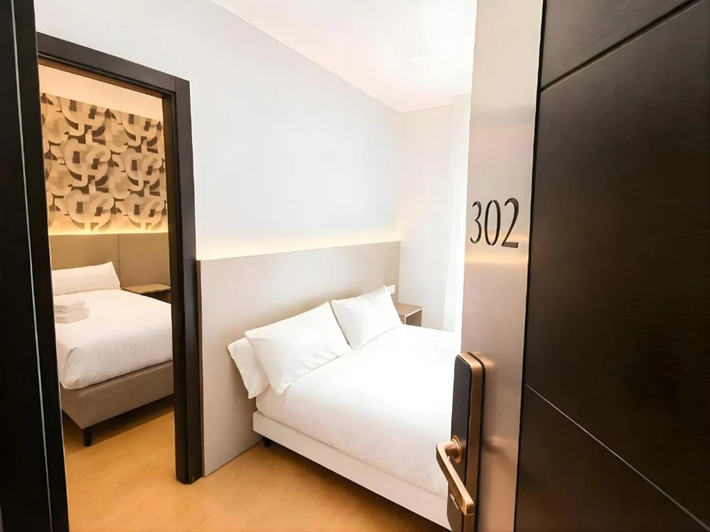 Habitación Cuádruple Clásica — Hotel Elizalde