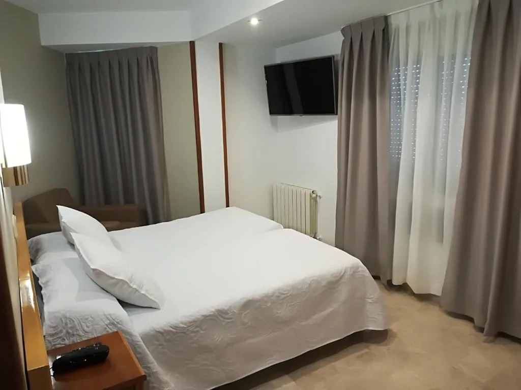 Quarto Duplo - 2 camas — Hotel Escudero