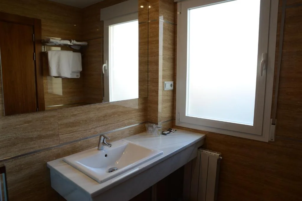 Quarto Duplo — Hotel Escudero