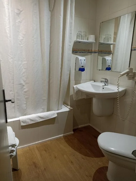 Quarto quádruplo — Hotel Europa