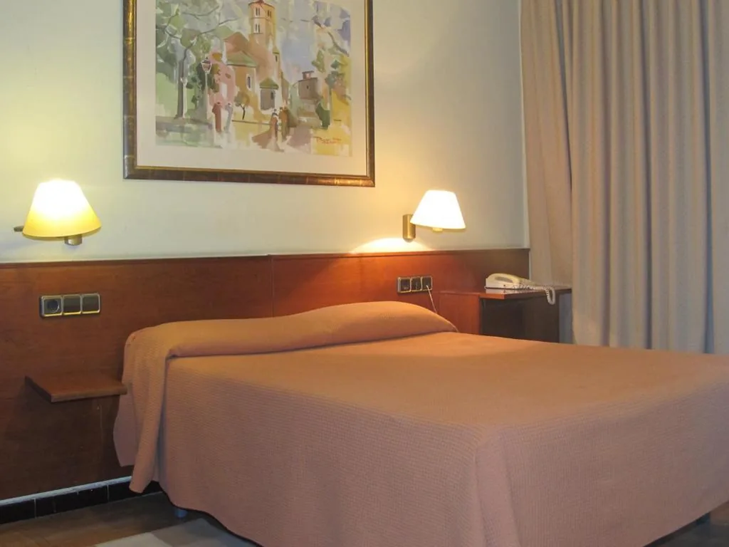 Quarto quádruplo — Hotel Europa