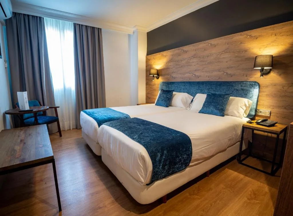 Twin Room — Hotel Familia Conde