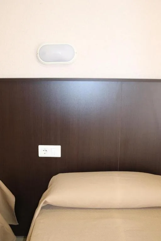 Quarto Individual Standard com casa de banho partilhada — Hotel Fin De Semana