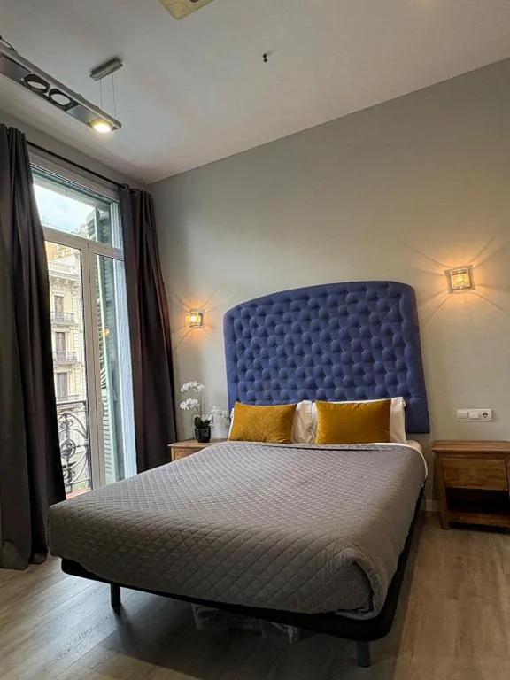 Driepersoonskamer — Hotel Ginebra