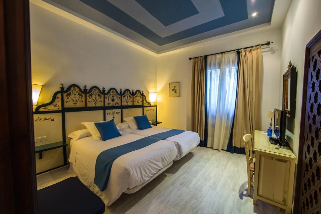 Habitación Triple — Hotel Hacienda del Cardenal