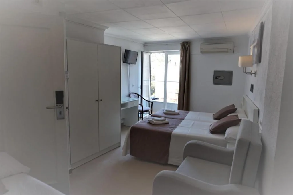 Quarto quádruplo — Hotel Hermes