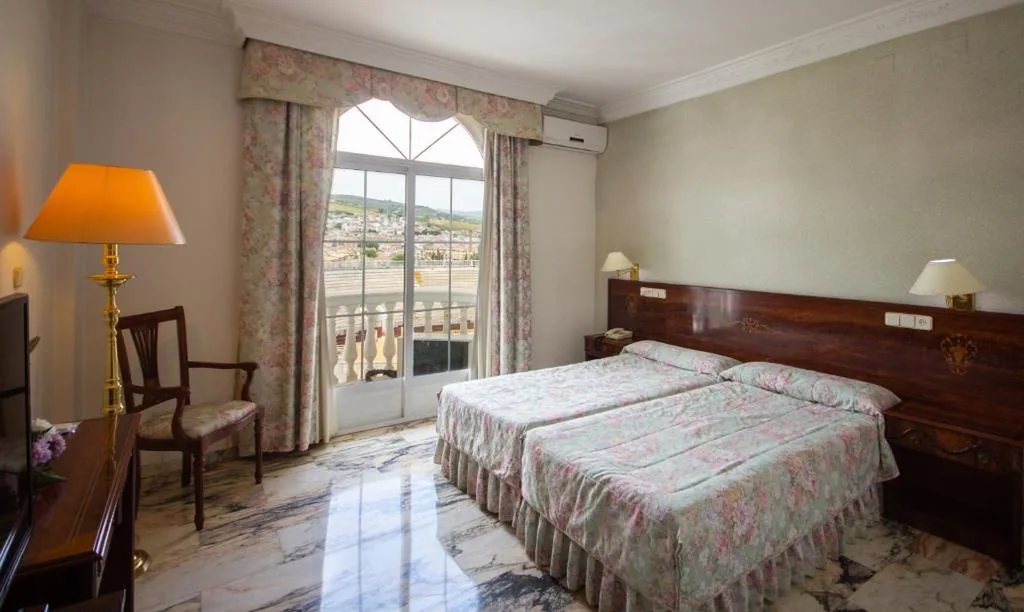 Dreibettzimmer — Hotel Hidalgo