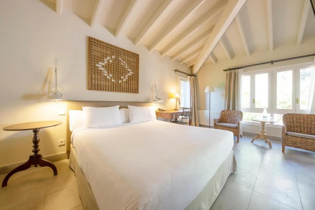 Habitación doble con jardín (1 adulto + 1 niño) — Hotel Huerto del Cura
