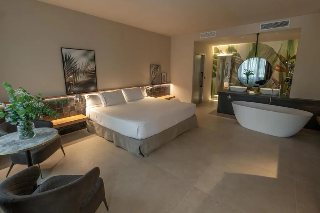 Suite Junior (1 adulto + 1 niño) — Hotel Huerto del Cura