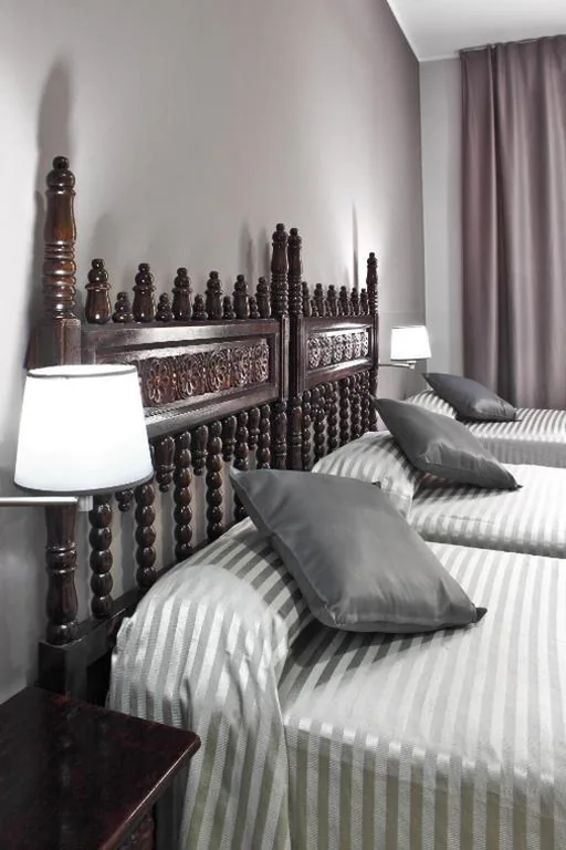 Dreibettzimmer — Hotel Inglés