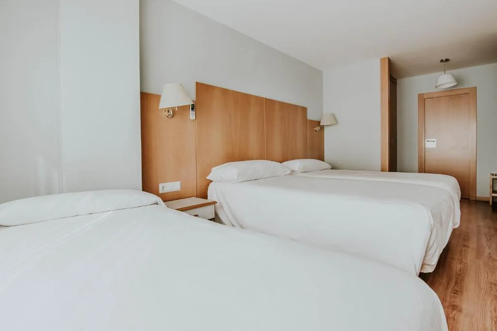 Quarto Triplo Executive — Hotel Isasa