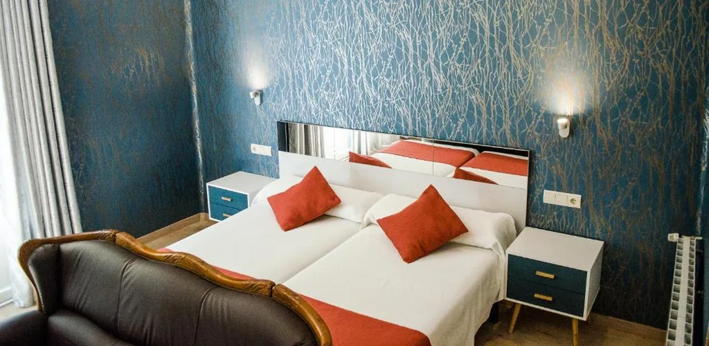 Habitación Triple Deluxe — Hotel Jaqués