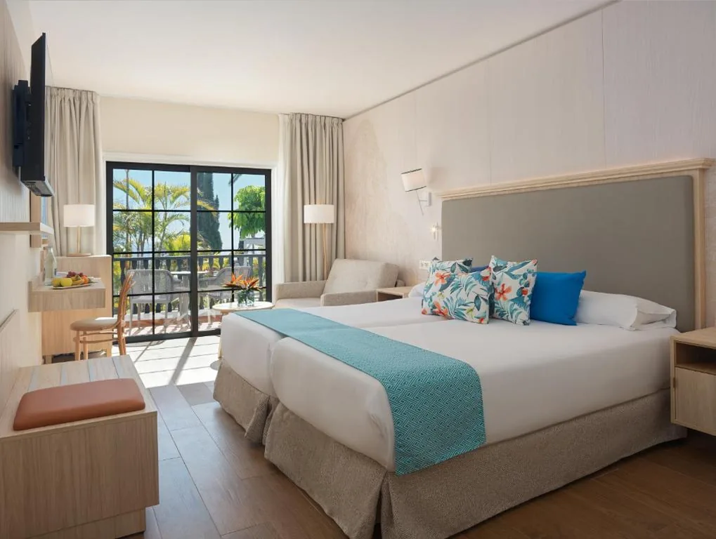 Habitación doble Oasis (2 adultos + 1 niño) — Hotel Jardín Tecina