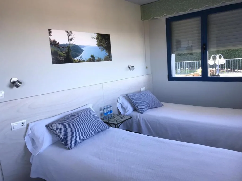 Camera doppia con letto supplementare — Hotel Kanala