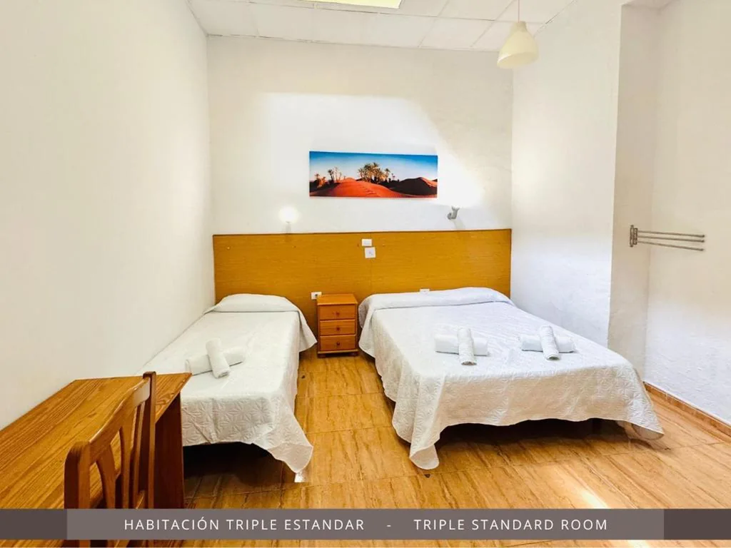 Hébergement Triple — Hotel Kasa