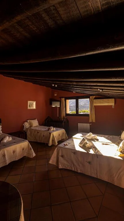 Habitación cuádruple — Hotel La Casa Grande del Burgo
