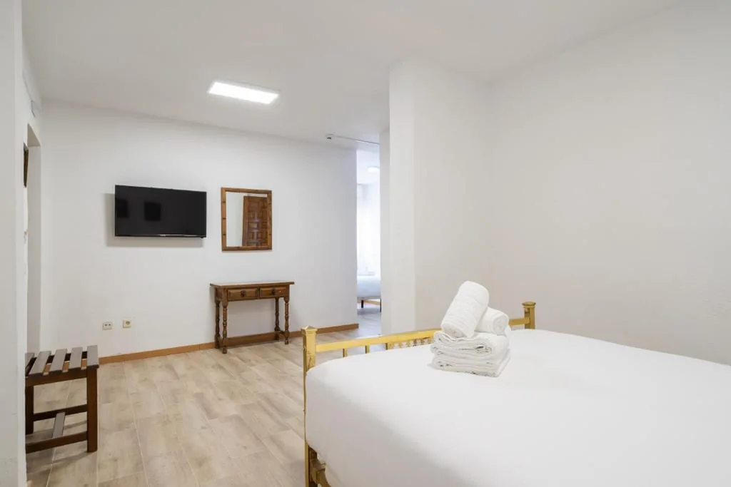 Dreibettzimmer — Hotel La Quinta de Santillán
