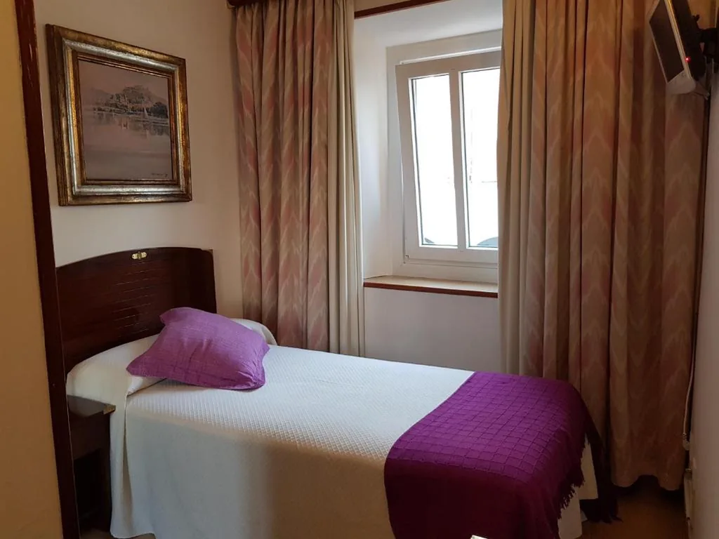 Habitación Triple — Hotel La Residencia