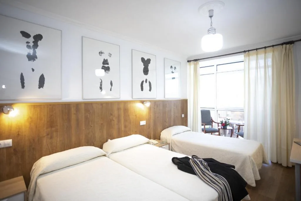 Tweepersoonskamer met extra bed (3 volwassenen) — Hotel La Ruta