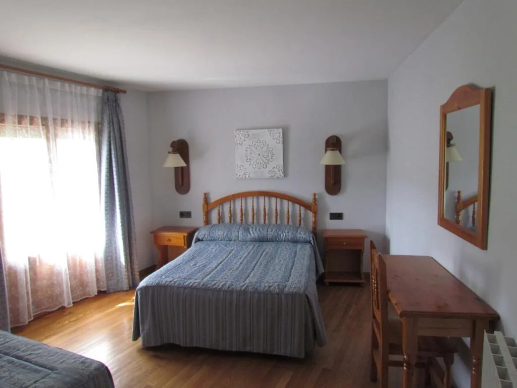 Habitación Triple con balcón — Hotel Las Nieves