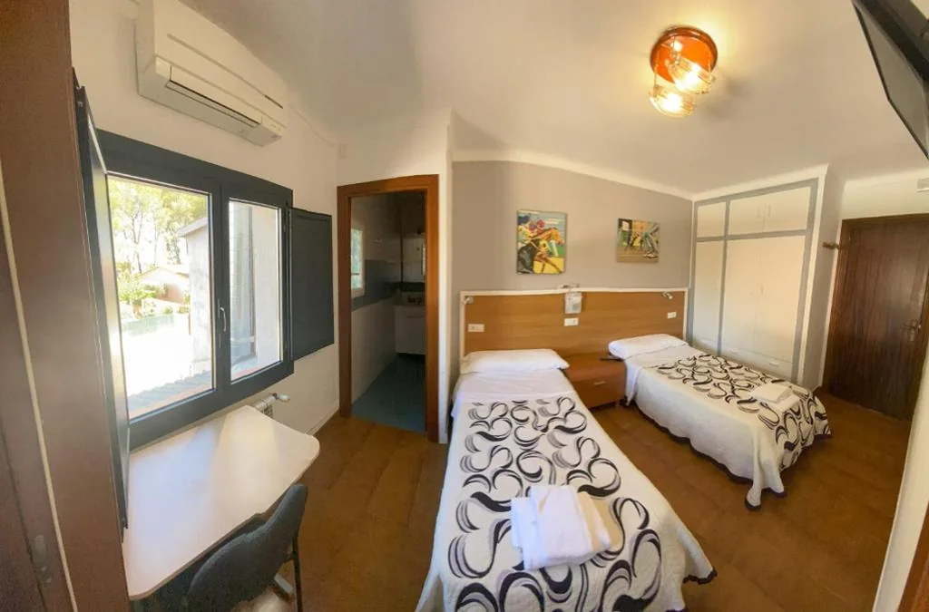 Quarto Quádruplo — Hotel Les Roques